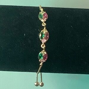 Elegant Gold Bracelet with Pink and Green Accents